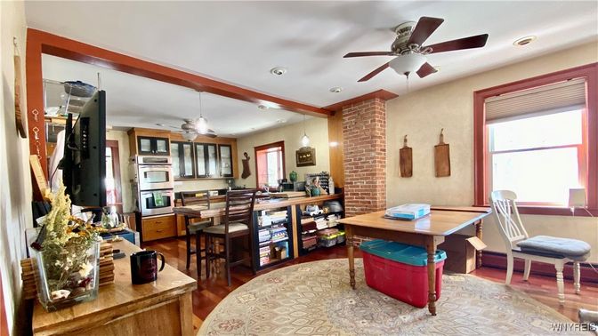 Dining room, Interior, Kitchen, Pendant Lights, Recessed Lighting, Stainless Steel Appliances, Stone Walls, Wood Texture Flooring