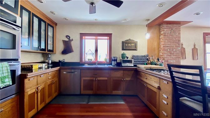 Interior, Kitchen, Pendant Lights, Recessed Lighting, Stainless Steel Appliances, Stone Walls, Wood Texture Flooring
