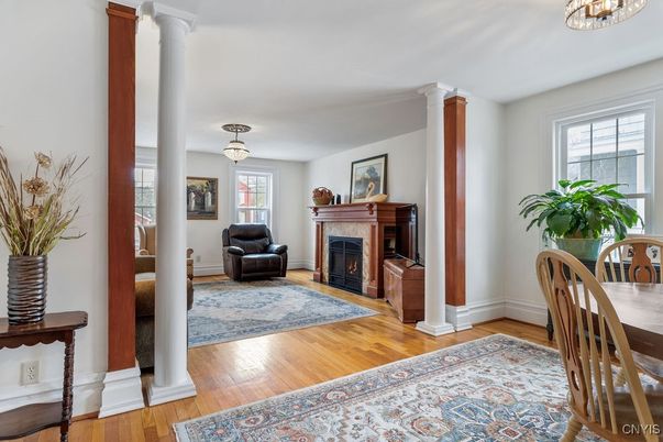 Dining room, Fireplace, Interior, Pendant Lights, Wood Texture Flooring