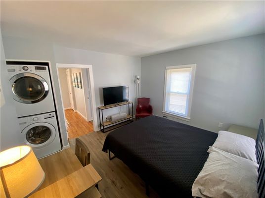 Bedroom, Interior, Utility Closets, Washer, Wood Texture Flooring