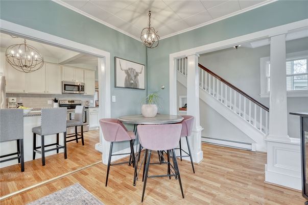 Chandelier, Dining room, Interior, Kitchen, Pendant Lights, Stainless Steel Appliances, Wood Texture Flooring