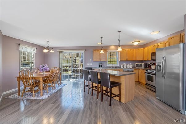 Dining room, Interior, Kitchen, Pendant Lights, Stainless Steel Appliances, Wood Texture Flooring