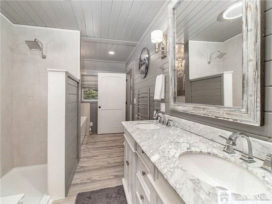Bathroom, Dual Sink Vanities, Interior, Recessed Lighting, Wood Texture Flooring