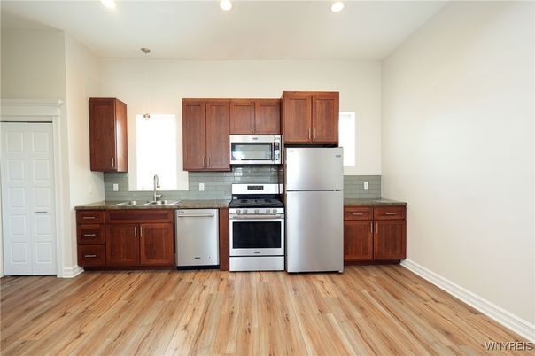 Interior, Kitchen, Pendant Lights, Recessed Lighting, Stainless Steel Appliances, Wood Texture Flooring