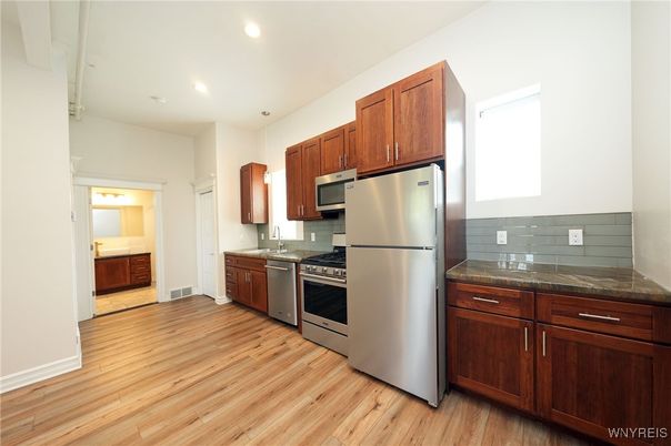 Interior, Kitchen, Recessed Lighting, Stainless Steel Appliances, Wood Texture Flooring