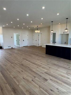 Empty room, Interior, Kitchen, Pendant Lights, Recessed Lighting, Wood Texture Flooring