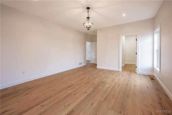 Chandelier, Empty room, Interior, Recessed Lighting, Wood Texture Flooring