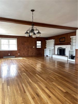 Chandelier, Empty room, Fireplace, Interior, Wooden Beams, Wood Texture Flooring, Wooden Walls