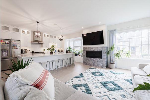 Fireplace, Interior, Kitchen, Living room, Pendant Lights, Recessed Lighting, Stainless Steel Appliances, Wood Texture Flooring
