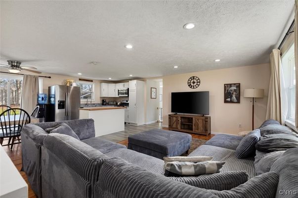 Dining room, Interior, Kitchen, Living room, Recessed Lighting, Stainless Steel Appliances, Wood Texture Flooring