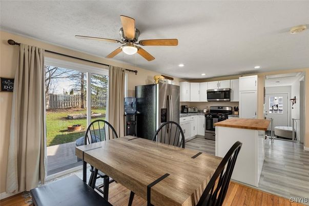 Dining room, Interior, Kitchen, Recessed Lighting, Stainless Steel Appliances, Wood Texture Flooring