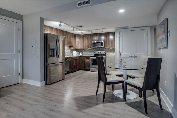 Dining room, Interior, Kitchen, Recessed Lighting, Stainless Steel Appliances, Wood Texture Flooring