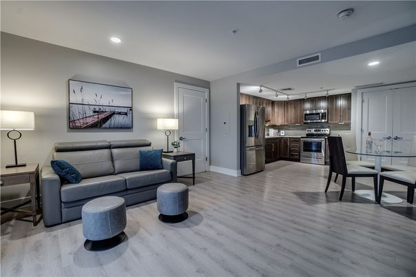 Dining room, Interior, Kitchen, Living room, Recessed Lighting, Stainless Steel Appliances, Wood Texture Flooring