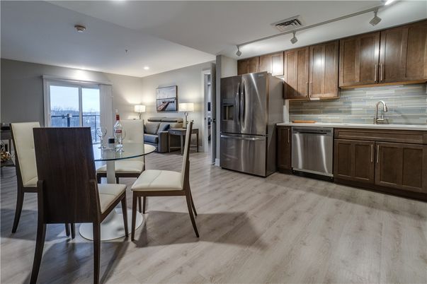 Dining room, Interior, Kitchen, Recessed Lighting, Stainless Steel Appliances, Wood Texture Flooring