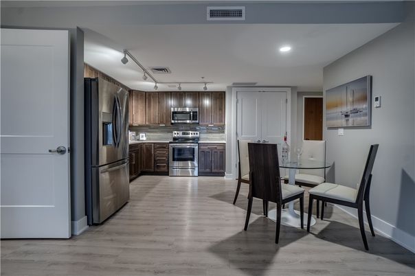Dining room, Interior, Kitchen, Recessed Lighting, Stainless Steel Appliances, Wood Texture Flooring