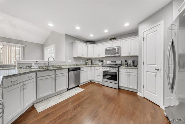 Interior, Kitchen, Recessed Lighting, Stainless Steel Appliances, Wood Texture Flooring