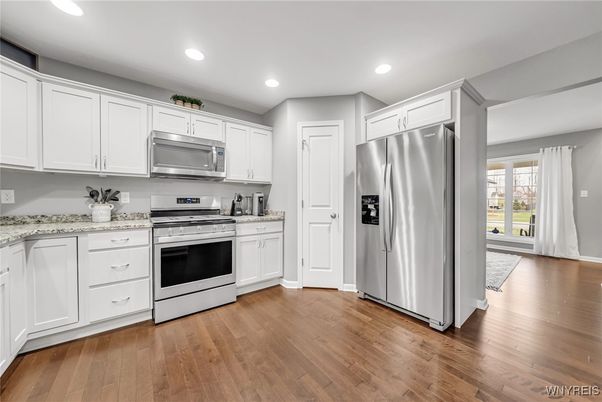 Interior, Kitchen, Recessed Lighting, Stainless Steel Appliances, Wood Texture Flooring