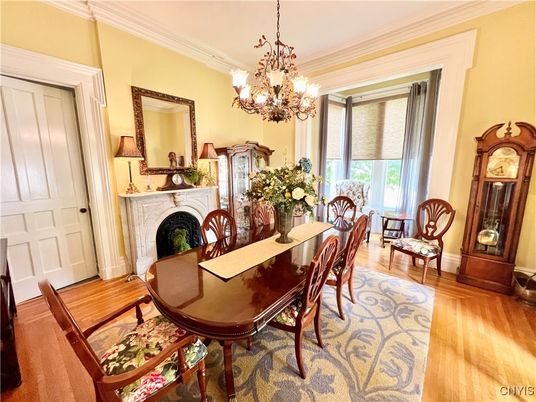 Chandelier, Dining room, Fireplace, Interior, Wood Texture Flooring
