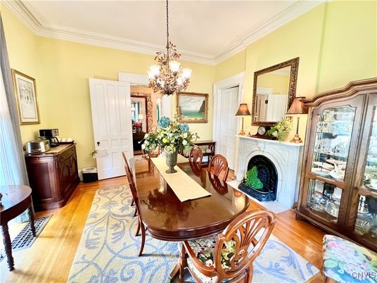 Chandelier, Dining room, Fireplace, Interior, Wood Texture Flooring