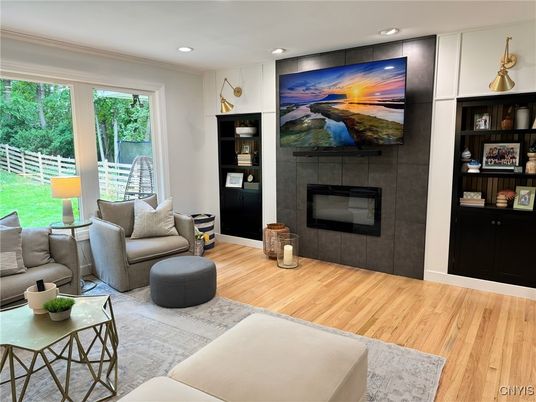 Fireplace, Interior, Living room, Recessed Lighting, Wood Texture Flooring