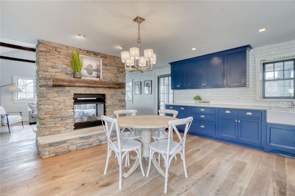 Chandelier, Dining room, Fireplace, Interior, Kitchen, Recessed Lighting, Stone Walls, Wood Texture Flooring