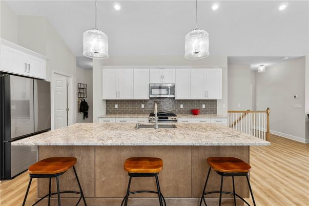 Interior, Kitchen, Pendant Lights, Recessed Lighting, Stainless Steel Appliances, Wood Texture Flooring