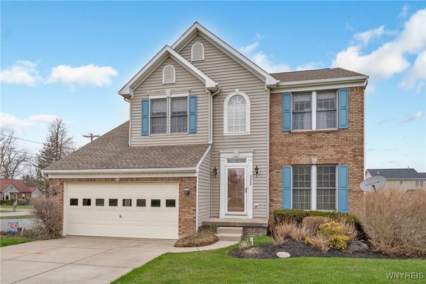 Attached, Exterior, Facade, Brick Facade, Brick Traditional