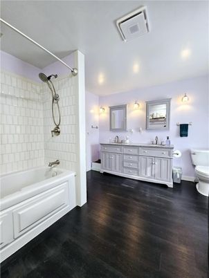 Bathroom, Dual Sink Vanities, Interior, Recessed Lighting, Wood Texture Flooring
