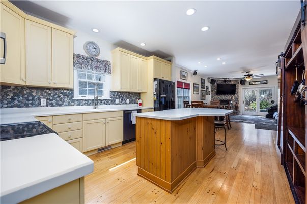 Fireplace, Interior, Kitchen, Recessed Lighting, Wood Texture Flooring