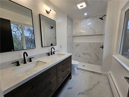 Bathroom, Dual Sink Vanities, Interior, Marble, Marble Walls, Recessed Lighting