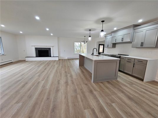 Fireplace, Interior, Kitchen, Pendant Lights, Recessed Lighting, Wood Texture Flooring