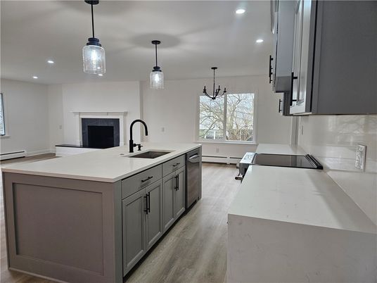 Fireplace, Interior, Kitchen, Pendant Lights, Recessed Lighting, Wood Texture Flooring