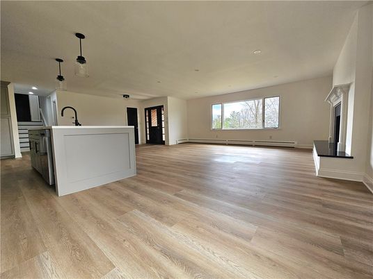 Empty room, Fireplace, Interior, Kitchen, Pendant Lights, Recessed Lighting, Wood Texture Flooring