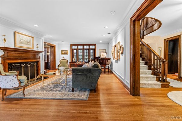 Fireplace, Interior, Living room, Piano, Recessed Lighting, Wood Texture Flooring