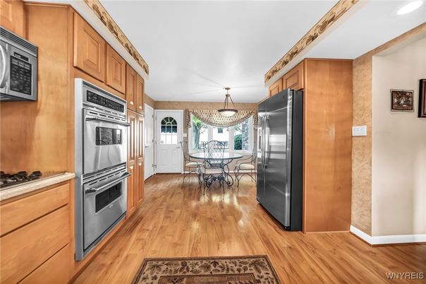 Dining room, Interior, Kitchen, Pendant Lights, Stainless Steel Appliances, Wood Texture Flooring