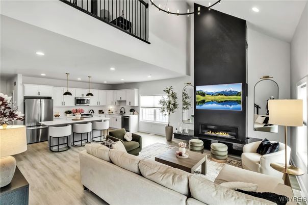 Fireplace, Interior, Kitchen, Living room, Pendant Lights, Recessed Lighting, Stainless Steel Appliances, Wood Texture Flooring