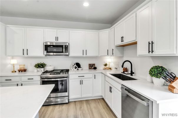 Interior, Kitchen, Recessed Lighting, Stainless Steel Appliances, Wood Texture Flooring