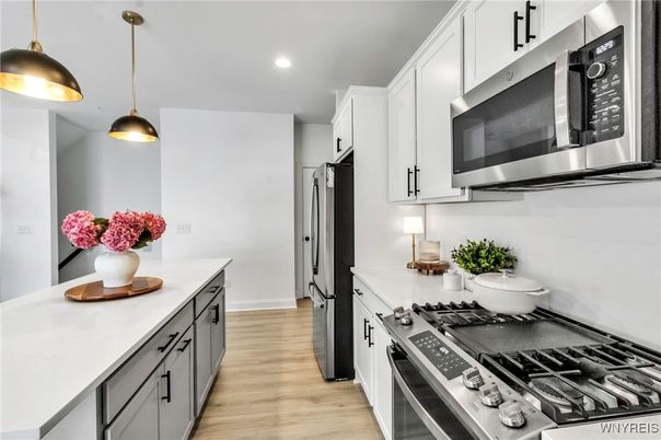 Interior, Kitchen, Pendant Lights, Recessed Lighting, Stainless Steel Appliances, Wood Texture Flooring