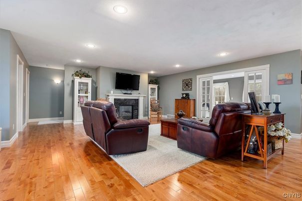 Fireplace, Interior, Living room, Recessed Lighting, Wood Texture Flooring