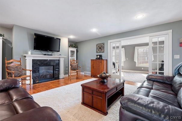 Fireplace, Interior, Living room, Recessed Lighting, Wood Texture Flooring