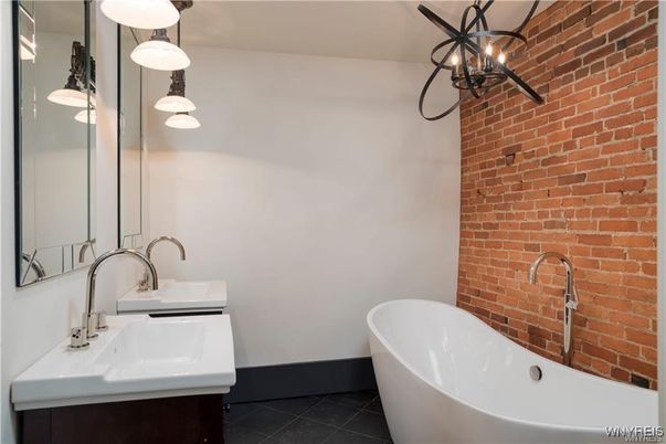 Bathroom, Dual Sink Vanities, Free Standing Baths, Interior, Pendant Lights, Stone Walls