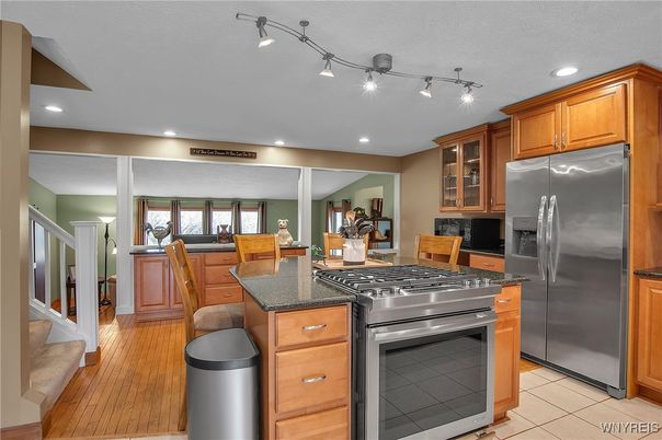Dining room, Interior, Kitchen, Recessed Lighting, Stainless Steel Appliances, Wood Texture Flooring