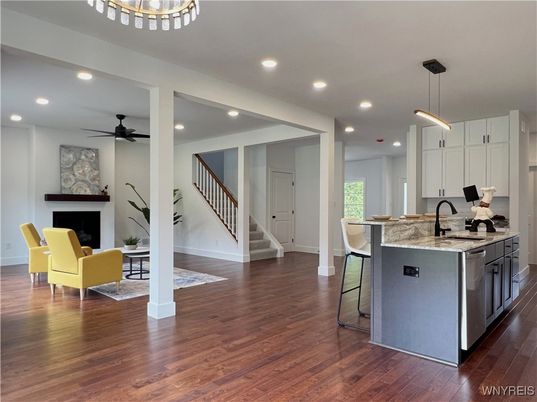 Dining room, Fireplace, Interior, Kitchen, Pendant Lights, Recessed Lighting, Wood Texture Flooring