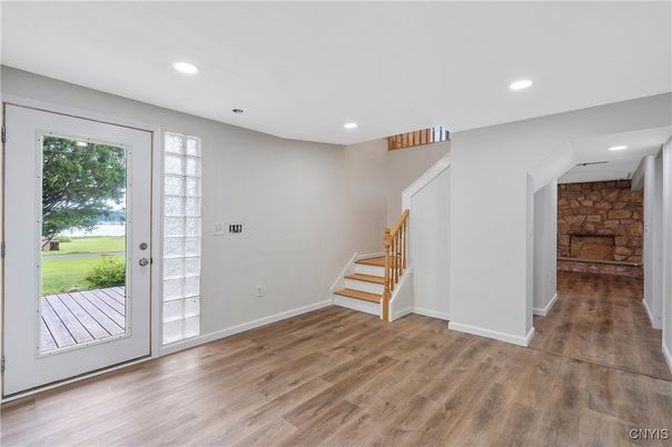Empty room, Interior, Recessed Lighting, Stone Walls, Wood Texture Flooring