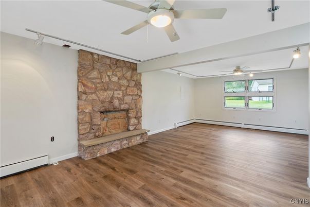 Empty room, Fireplace, Interior, Stone Walls, Wood Texture Flooring