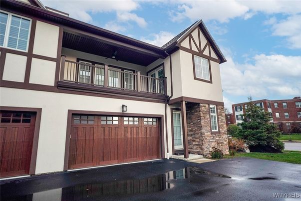 Attached, Exterior, Facade, Tudor Revival