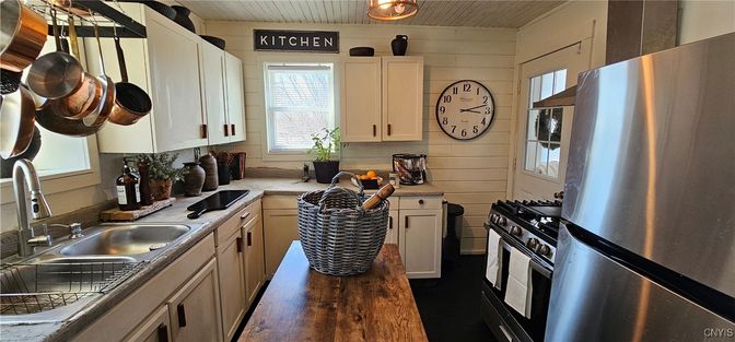 Interior, Kitchen, Stainless Steel Appliances, Tile Countertops, Wood Texture Flooring