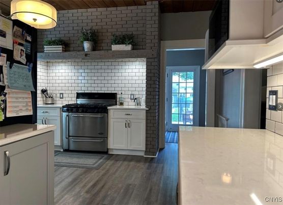 Interior, Kitchen, Stainless Steel Appliances, Stone Walls, Wood Texture Flooring