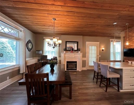 Chandelier, Dining room, Fireplace, Interior, Pendant Lights, Wooden Ceilings, Wood Texture Flooring
