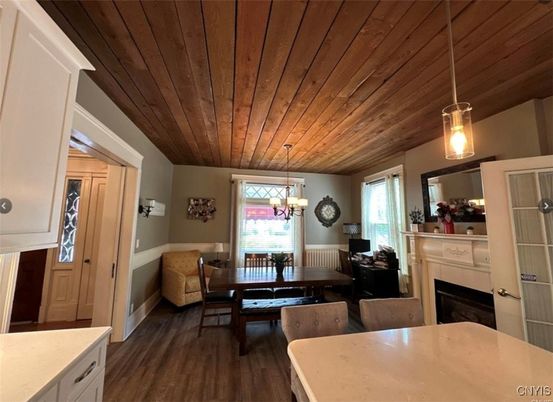 Dining room, Fireplace, Interior, Pendant Lights, Wooden Ceilings, Wood Texture Flooring